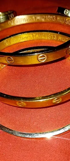 3 براسلي مع 2 خواتم  مقلدة لشركة cartier